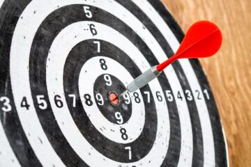 Dart hitting the bullseye
